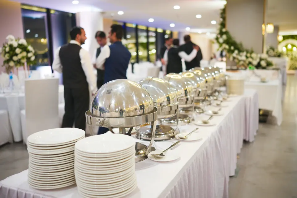 Guests and service staff at a corporate event at Melrose Arch