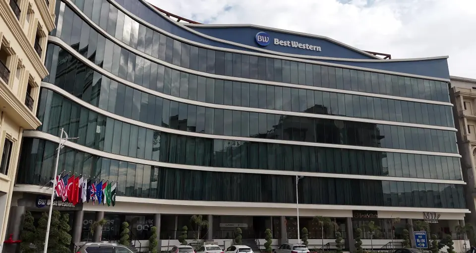 Melrose Arch and Best Western Rawalpindi Central main facade by day