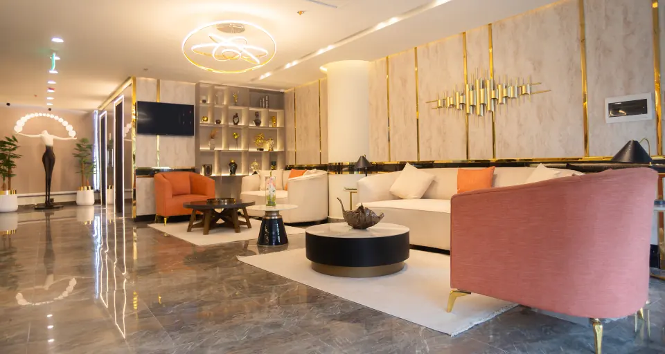 Lobby lounge with gold detailing at Melrose Arch