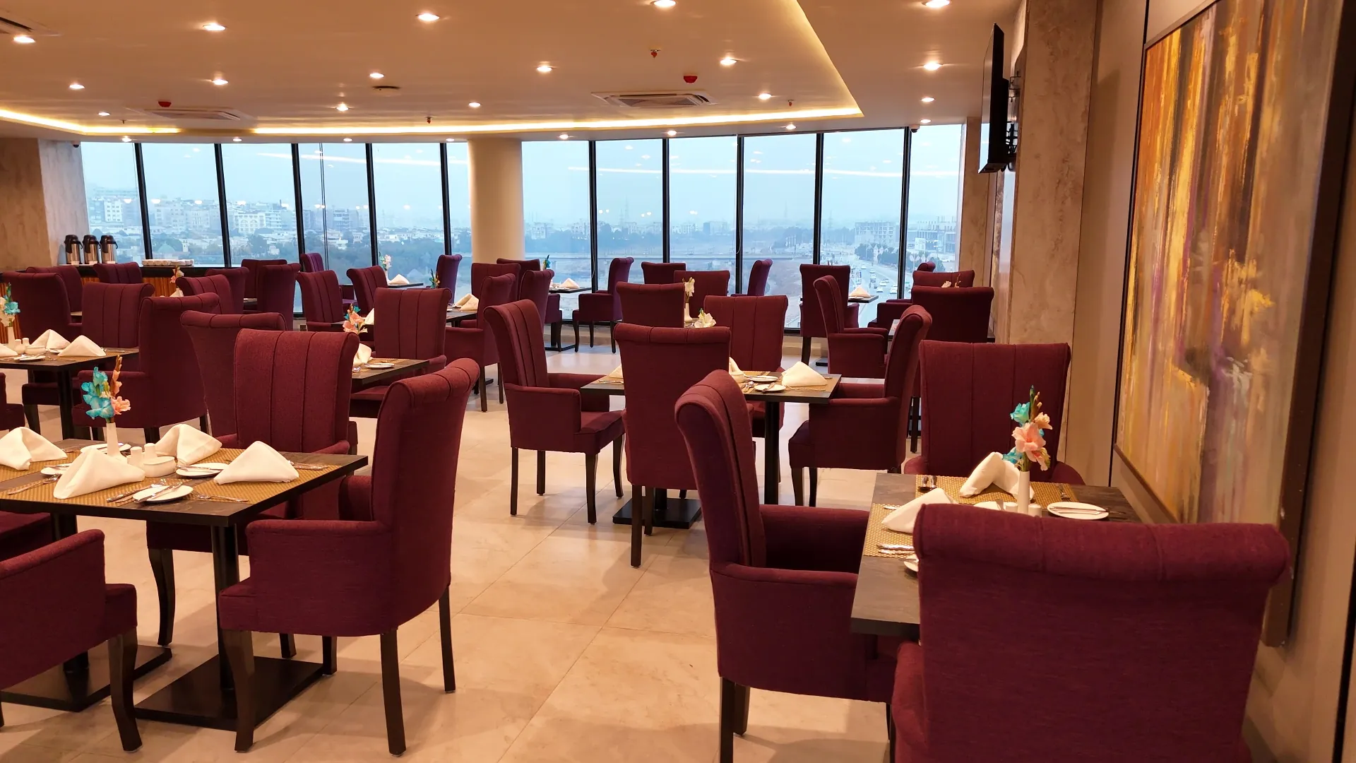 Restaurant with floor-to-ceiling windows at Melrose Arch