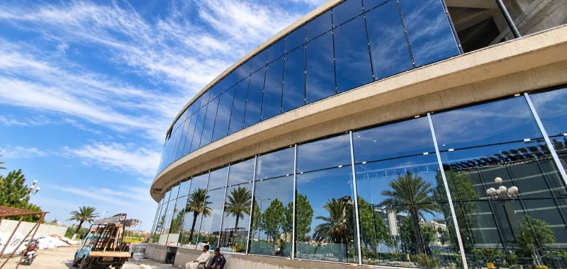 New blue glass panels installed across the curved Sky Luxe façade on 28 September 2026