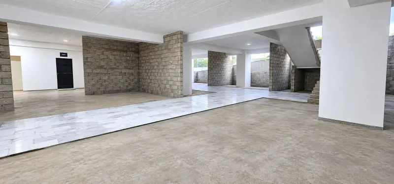 Marble flooring being laid near the Sky Luxe stair core
