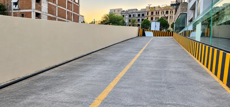 Completed Sky Luxe vehicle ramp with safety barriers